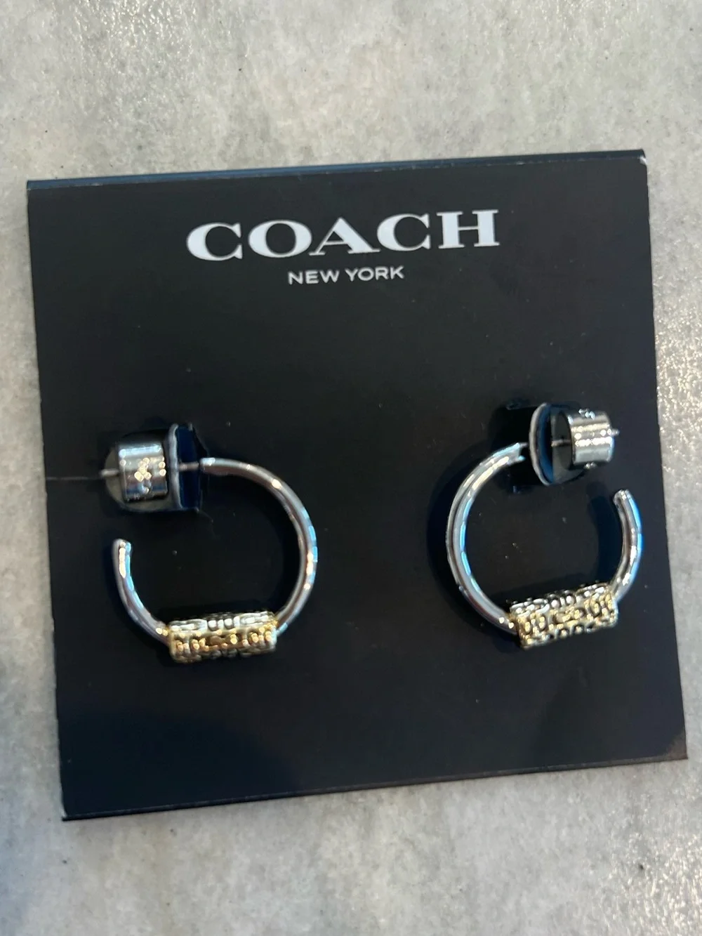 Coach Two-Tone Silver Hoop Earrings with Gold Engraved Barrel